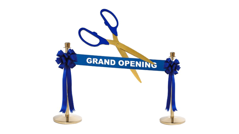 Deluxe Grand Opening Kit – 25″ Black/Silver Ceremonial Ribbon Cutting Scissors with 5 Yards of 6″ Royal Blue Grand Opening Ribbon, 2 Royal Blue Bows and 2 White Plastic Stanchions | Rental