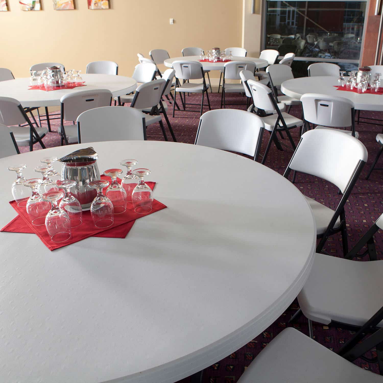 Package – (12) 72″ Round Commercial Grade Folding Tables and (120) Folding Chairs, White Granite | Rental
