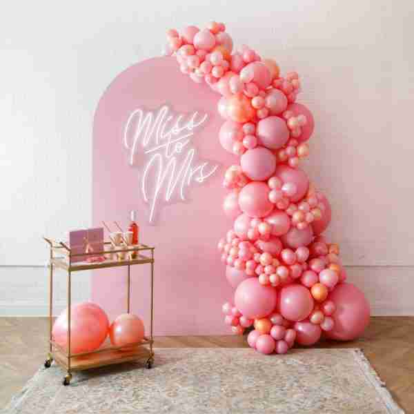 Rosé Bubbles - The Aadi Panel with Garland and Neon Sign